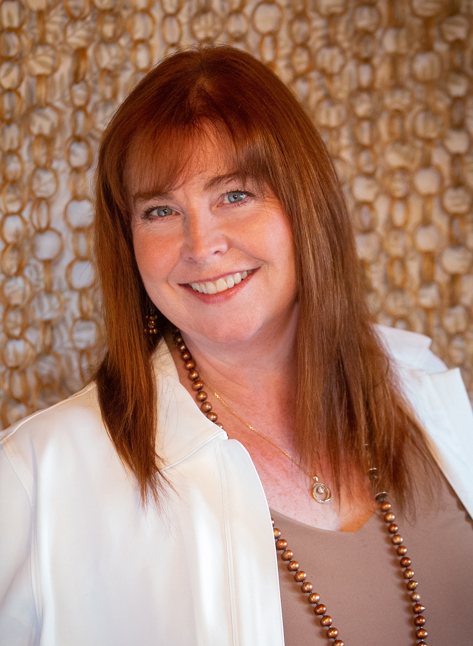 Juli Bacon - Managing Director / Treasure